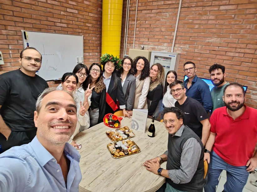 M.O.D.A.L. colleagues gathered for a graduation celebration · 2026