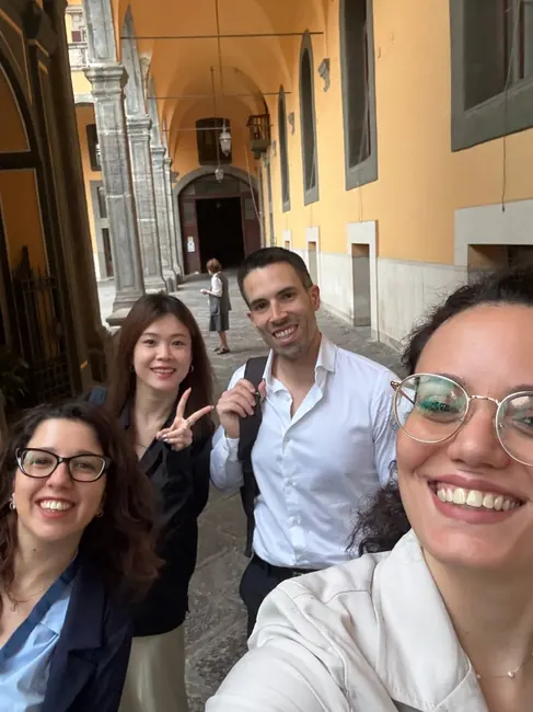 Researchers pictured together on campus · 2026