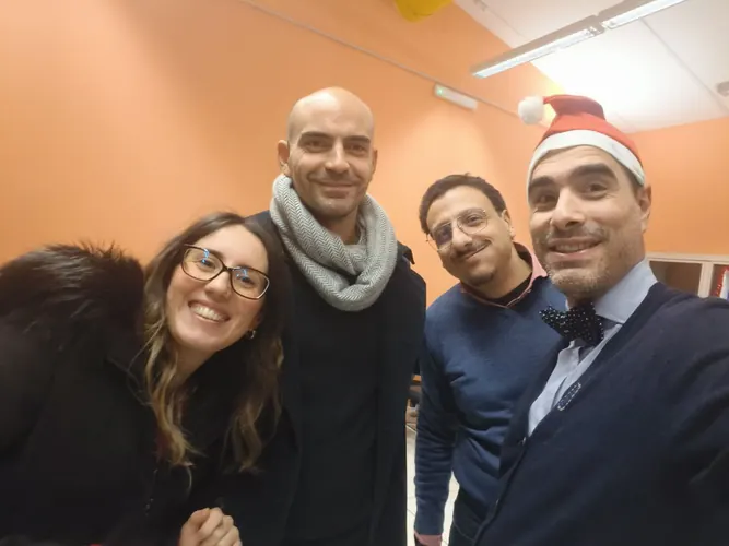 Friends and colleagues in a festive group photograph